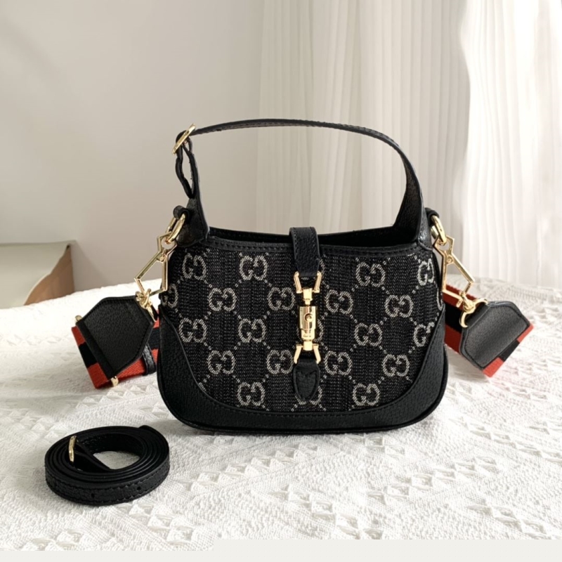 G*u*i top handle bags